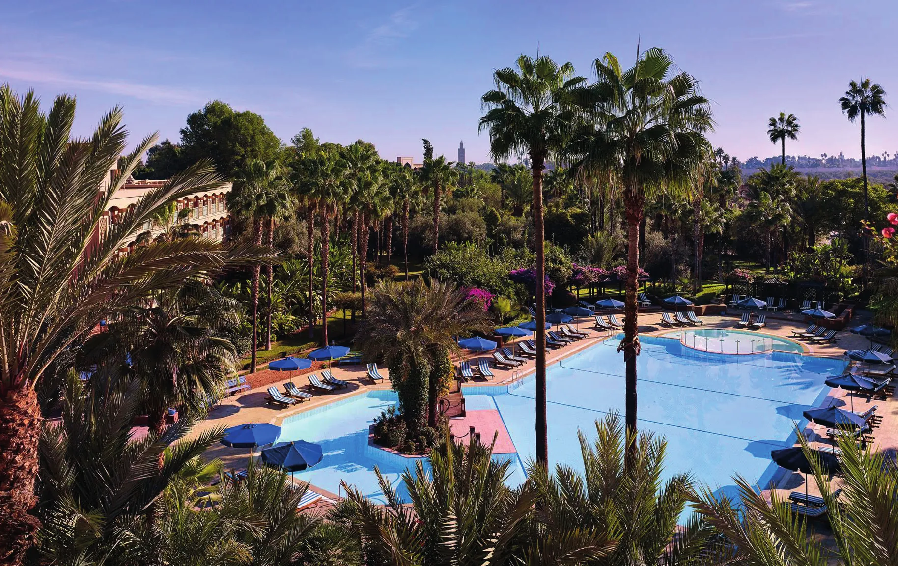 The large pool at Le Méridien N'Fis seen from above, among palm trees